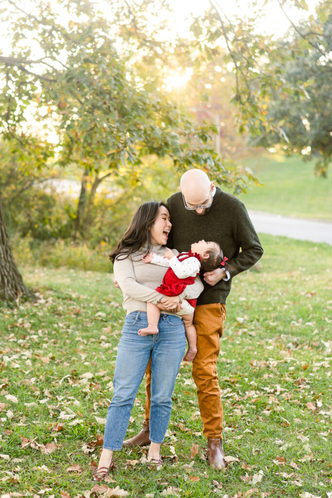 A family smiling at each other.